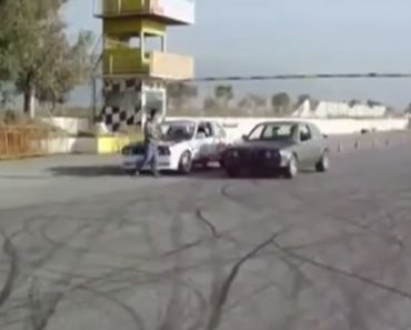 Two BMWs drifting